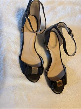 Cole Haan Black Leather Ankle-Strap Bow Heels with Gold Plaque